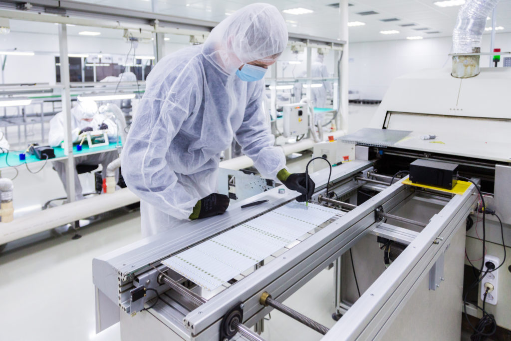 A technician working on a machine