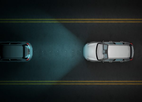 Overhead view of two cars on the road