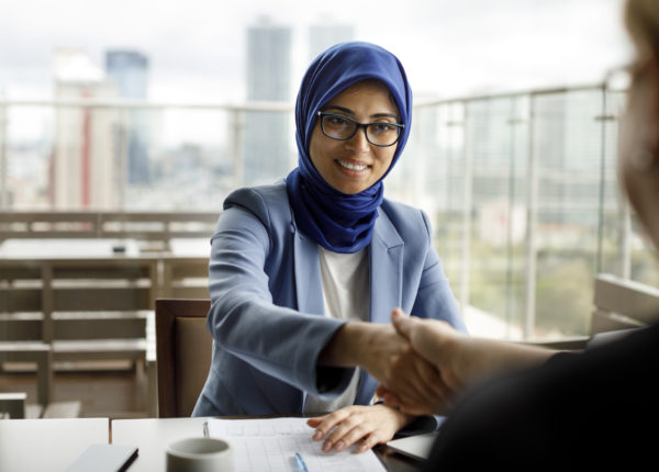 Woman giving a handshake